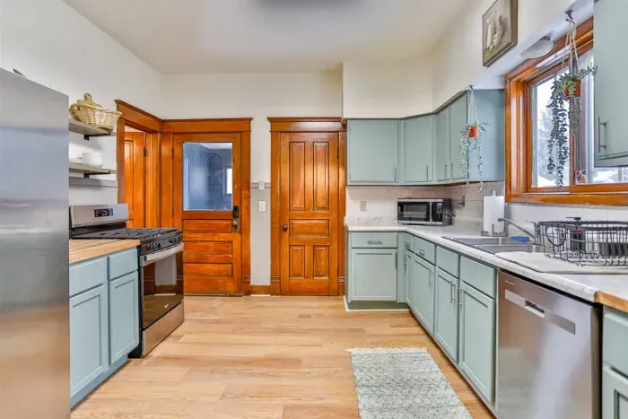 Enjoy natural light, classic wood trim, and a warm, functional layout perfect for home-cooked meals.