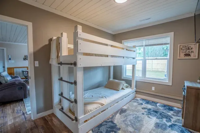 Indulge in comfort at our Airbnb retreat with a luxurious Bunk bed. Beat the heat with an efficient air conditioning system for a refreshing stay. Discover ultimate relaxation with our thoughtfully designed bedroom