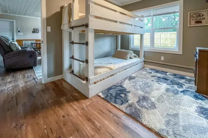 Indulge in comfort at our Airbnb retreat with a luxurious Bunk bed. Beat the heat with an efficient air conditioning system for a refreshing stay. Discover ultimate relaxation with our thoughtfully designed bedroom