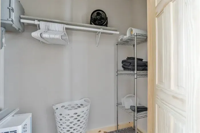 Comfortable private bedroom with natural light, fresh linens, and a cozy feel.