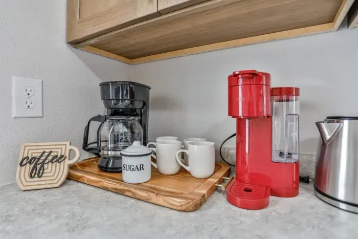 Cozy kitchen stocked with basic essentials for quick and simple meals.