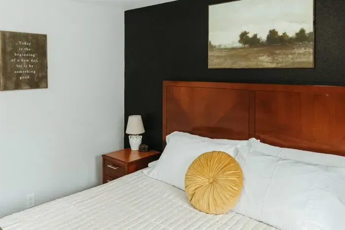 Your private sanctuary awaits – enjoy a restful night's sleep in our cozy bedroom.

Television