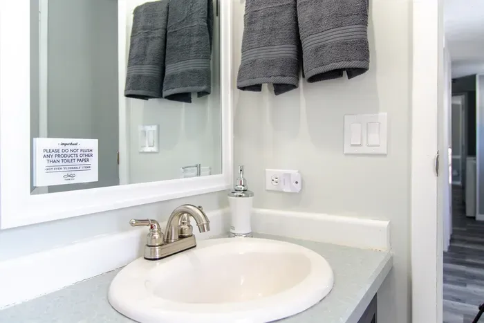 Clean, well-equipped bathroom with a convenient sink.