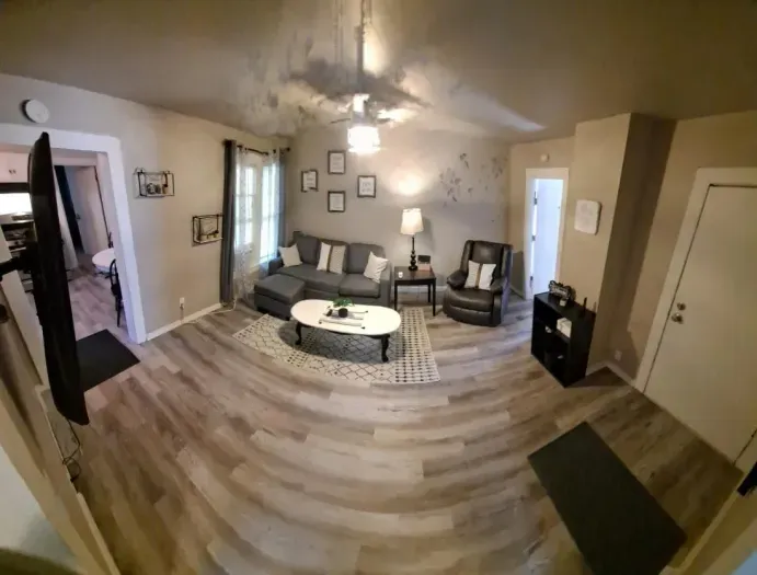 Spacious living room with elegant decor and views