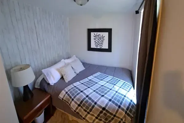 Luxurious master bedroom with a king-size bed for ultimate comfort