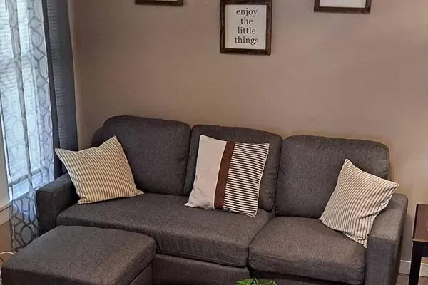 Spacious living room with elegant decor and views