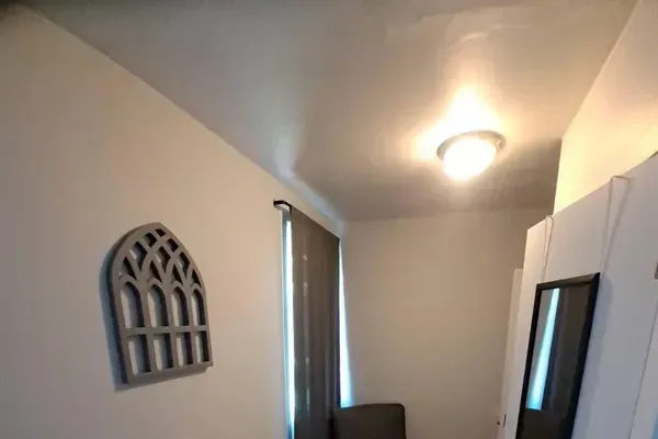 Spacious living room with elegant decor and views