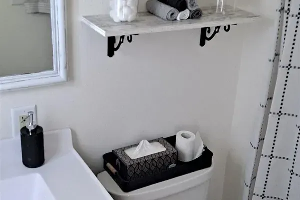 Spa-like bathroom with deluxe amenities and tub