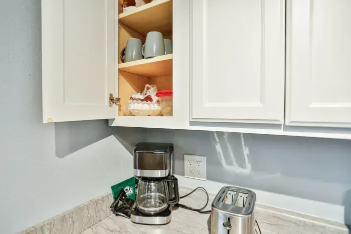 Start your mornings with ease using the kitchen coffee maker and toaster, with mugs and essentials ready for your stay.