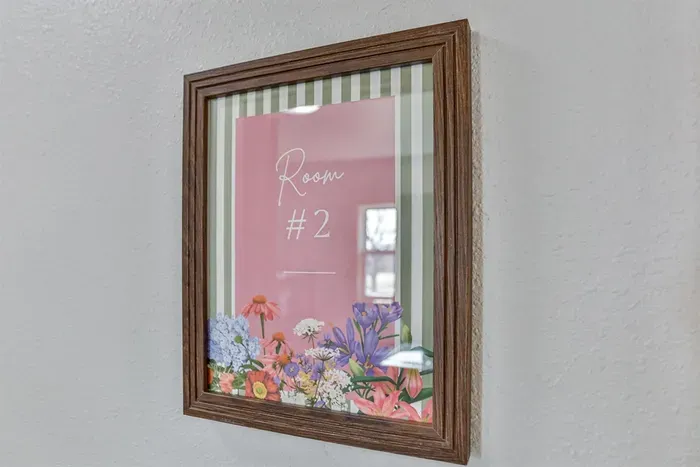 Elegant bedroom with hotel-quality bedding and a warm, relaxing ambiance.