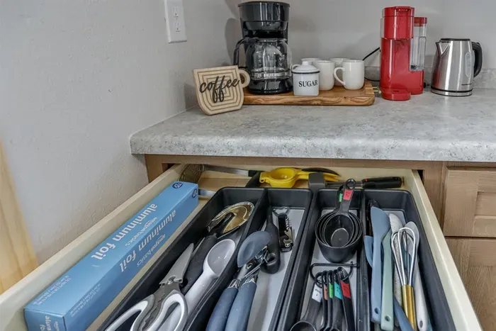 Cozy kitchen stocked with basic essentials for quick and simple meals.