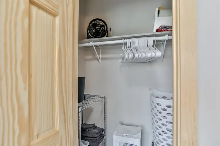 Relaxing bedroom space with modern decor, comfy mattress, and serene atmosphere.