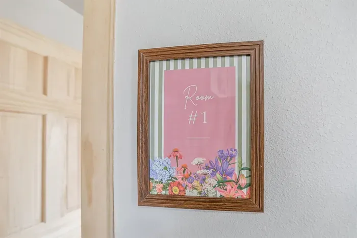 Chic and cozy bedroom ideal for travelers seeking comfort, convenience, and tranquility.