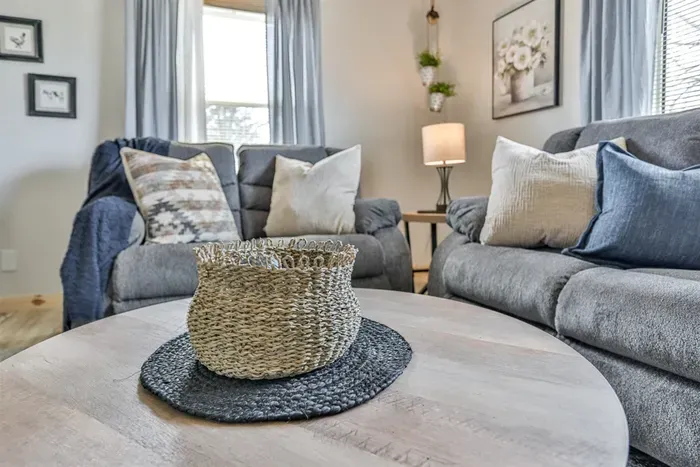 Comfortable lounge with soft seating and a warm feel.