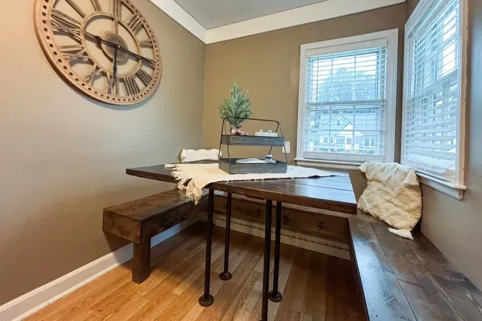 Modern and efficient—everything you need to create a delicious meal. The kitchen features a stainless steel refrigerator, stove, coffee maker, kitchenette oven, kettle, and blender