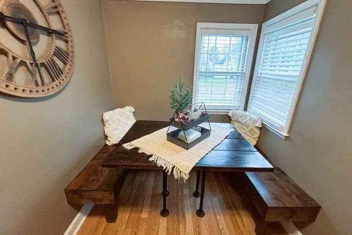 Modern and efficient—everything you need to create a delicious meal. The kitchen features a stainless steel refrigerator, stove, coffee maker, kitchenette oven, kettle, and blender