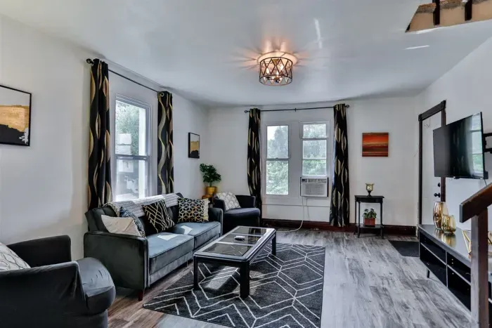 Spacious living room with elegant decor and views