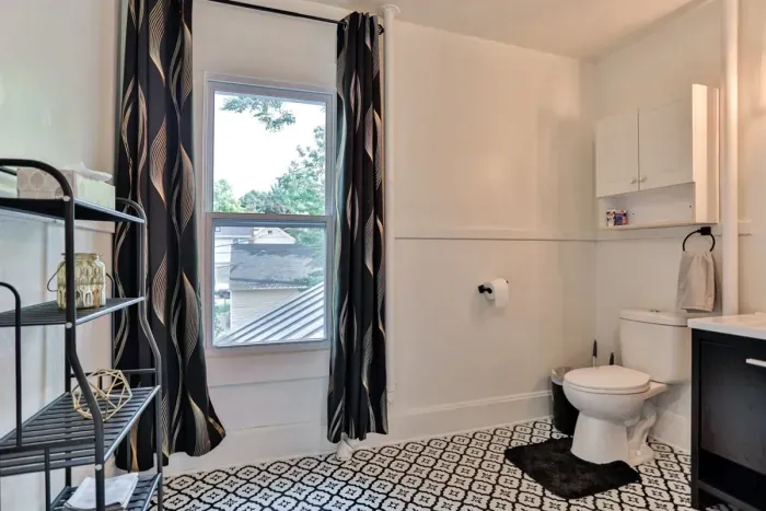 Spa-like bathroom with deluxe amenities and tub