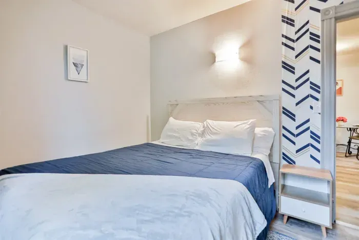 Luxurious master bedroom with a king-size bed for ultimate comfort