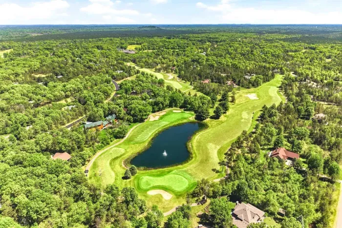 Tee off into a scenic escape surrounded by rolling fairways, sparkling water views, and endless treetop horizons.