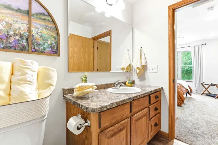 Start and end the day with ease in a bright ensuite bath, complete with warm finishes and fresh, thoughtful touches.