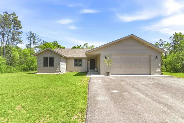 Arrive to a peaceful single-level retreat with wide open space, easy parking, and wooded surroundings that set the tone for a relaxing stay.