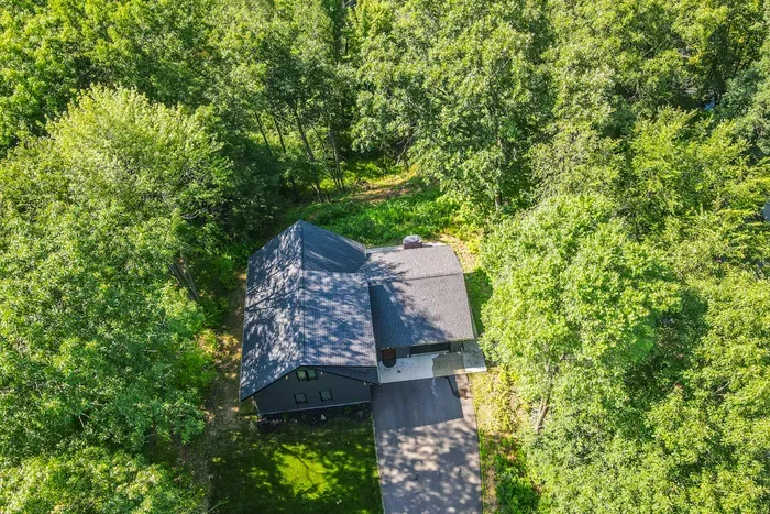 Take in the peaceful setting with sweeping waterfront views surrounded by lush trees and rolling hills.