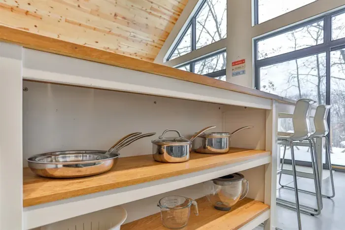 Cook comfortably with provided pots and pans.