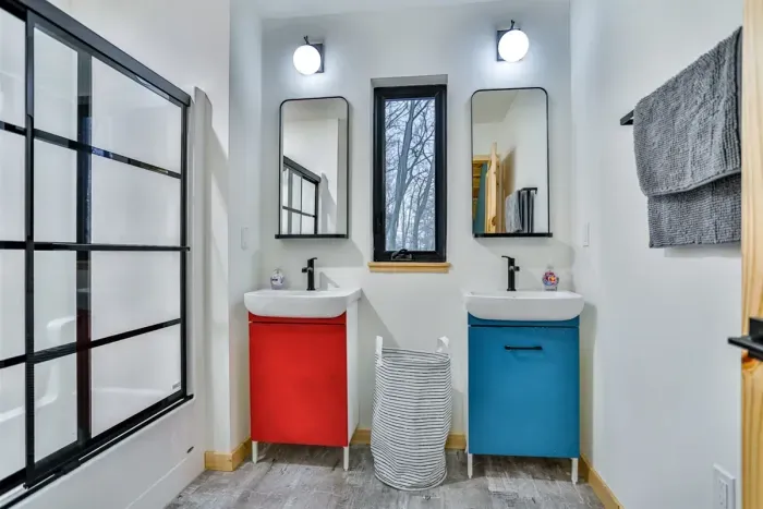Spacious double vanity with his-and-hers sinks - perfect for couples or shared mornings.