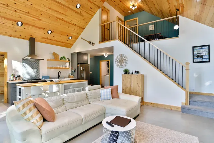 Cozy living area with Smart TV, heated floors, and space to relax or gather after a day of adventure.