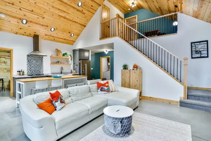 Cozy living area with Smart TV, heated floors, and space to relax or gather after a day of adventure.