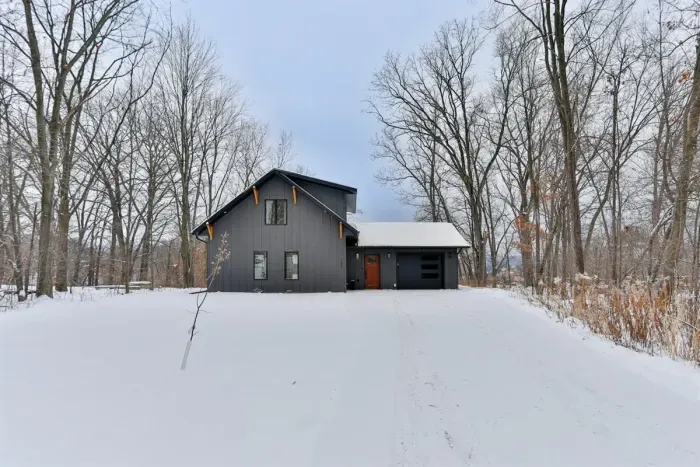 Cozy 3BR winter retreat with scenic snowy views, a private dock, and inviting year-round comfort.