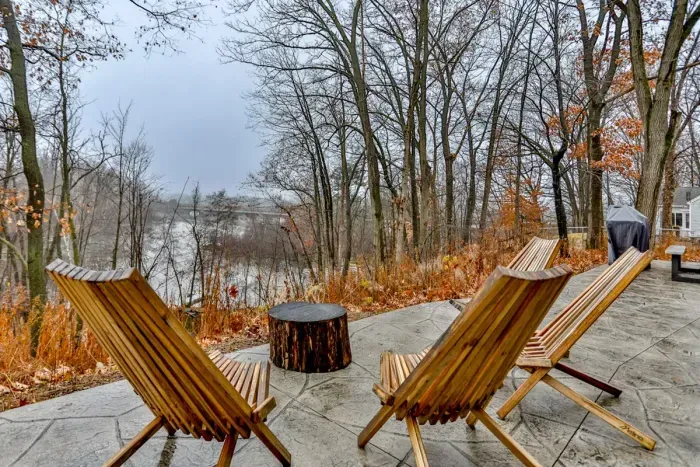 Enjoy peaceful moments or group meals with waterfront views on the private patio.