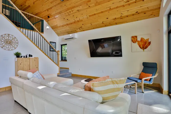 Spacious and comfortable living room with room for the whole group to gather.