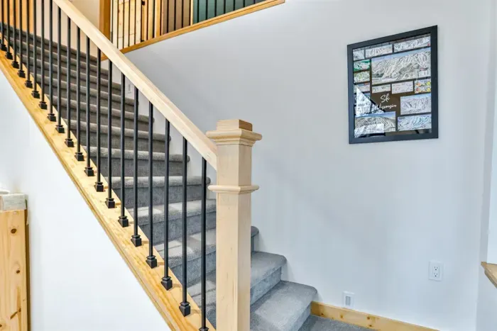 Sturdy interior stairs connect the main living space to upper-level bedrooms.