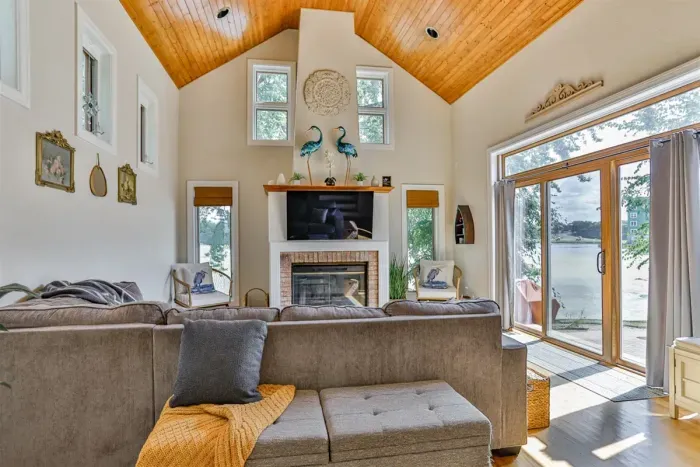 Indulge in comfort and style in our living room, featuring plush sofas, and elegant chairs. Cozy up by the fireplace, and unwind with entertainment on the TV.