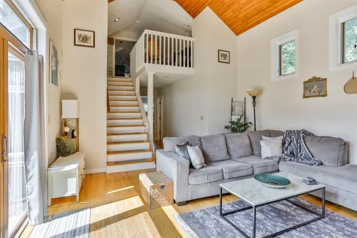 Indulge in comfort and style in our living room, featuring plush sofas, and elegant chairs. Cozy up by the fireplace, and unwind with entertainment on the TV.