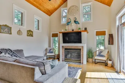 Indulge in comfort and style in our living room, featuring plush sofas, and elegant chairs. Cozy up by the fireplace, and unwind with entertainment on the TV.