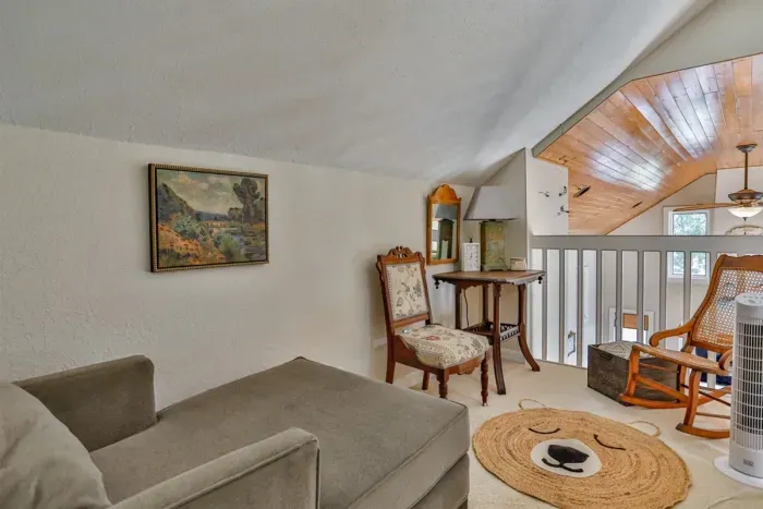 Modern and efficient—everything you need to create a delicious meal. The kitchen features a stainless steel refrigerator, stove, coffee maker, kitchenette oven, kettle, and blender