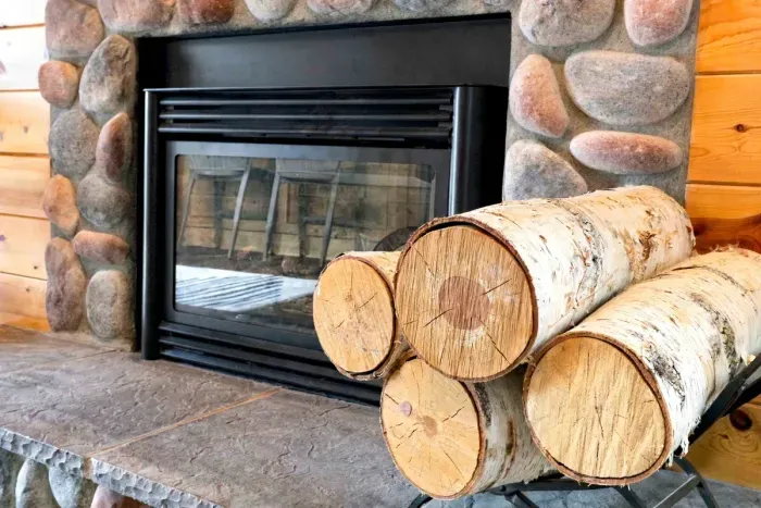 Cozy up on cool evenings by the fireplace with freshly stacked firewood ready to burn.