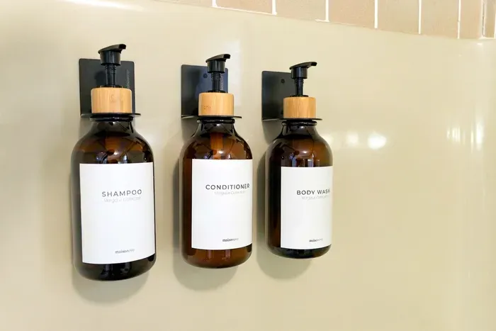 Enjoy a spa-like shower experience with complimentary shampoo, conditioner, and body wash provided in refillable pumps.