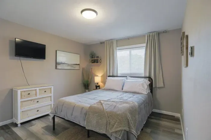 Serene and inviting – experience ultimate comfort in our thoughtfully designed bedroom.