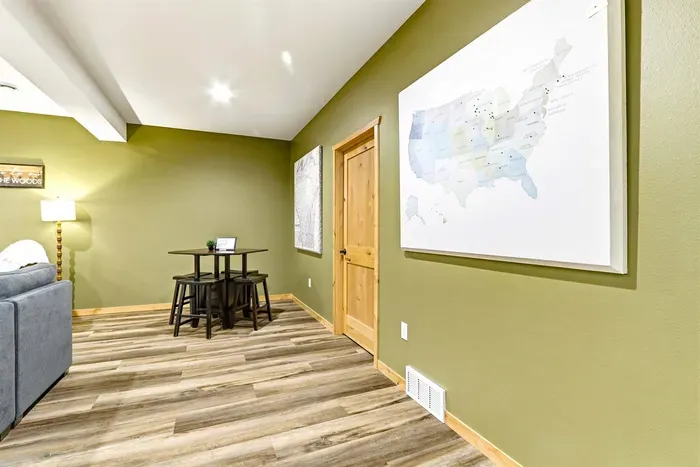 Bright TV Lounge Downstairs with Comfortable Seating