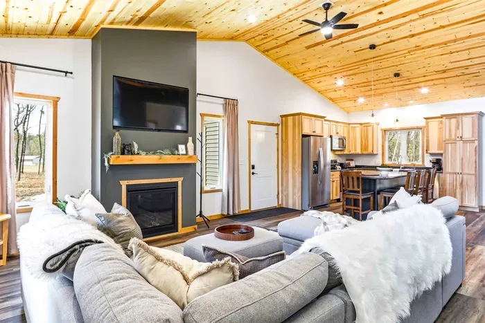 Relaxing Living Area with Fireplace, TV & Cozy Couch