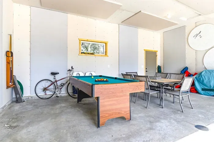 Playful Game Room Featuring Billiards Table