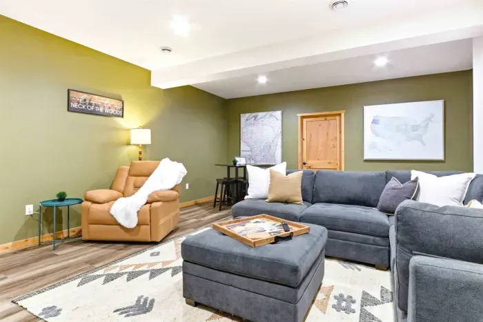 Bright TV Lounge Downstairs with Comfortable Seating