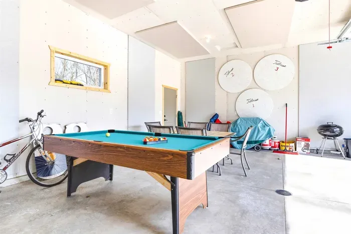 Spacious Game Room with Billiards in Garage