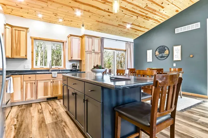 Fully Equipped Kitchen with Wooden Cabinets & Center Counter
