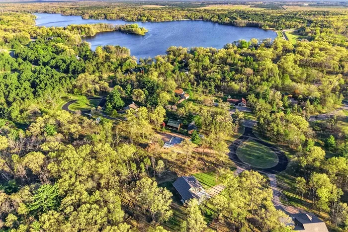 Beautiful rural perspective with sweeping views of forest, fields, and a private residential setting.