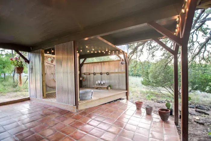 Outdoor hot tub/ bath tub patio.